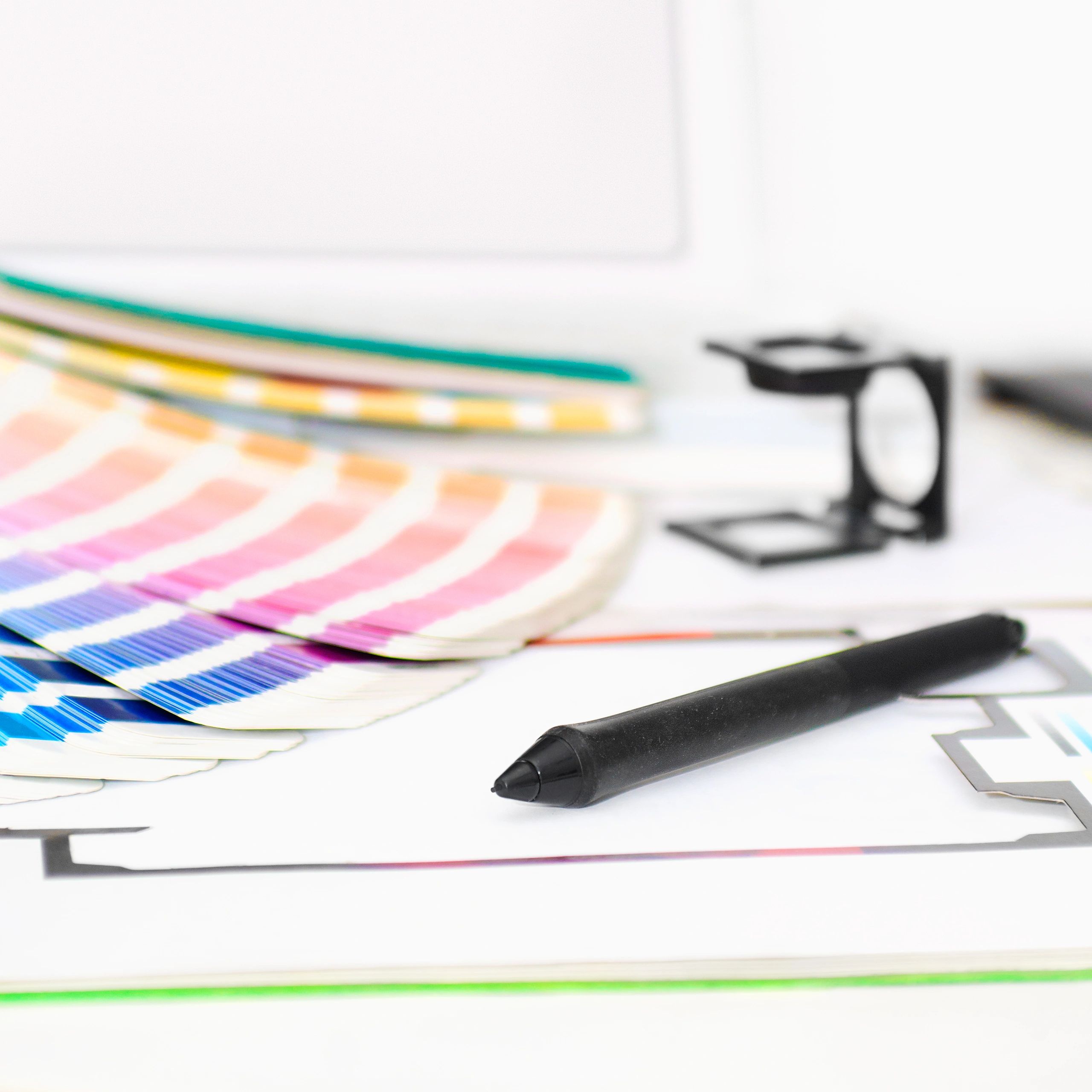 Design tools and planning materials on a desk
