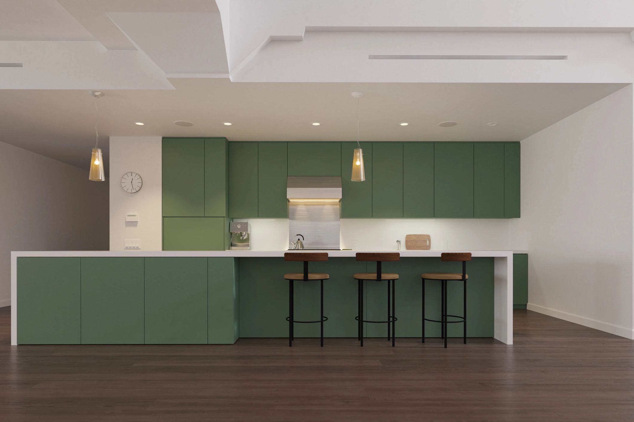 Modern kitchen with green cabinetry and white island